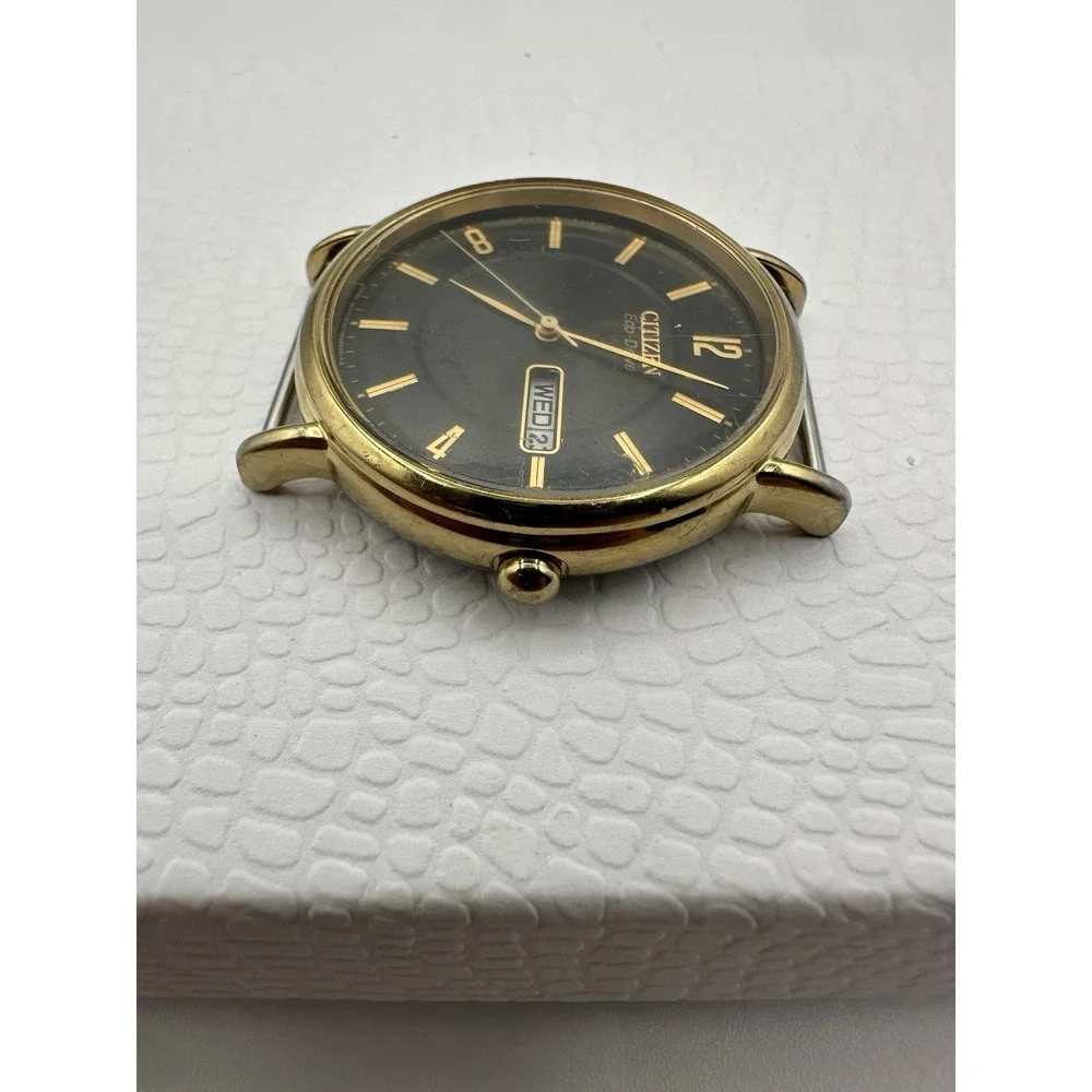 Citizen Eco-Drive Men's Gold-Tone Watch Head E101-S016688 Black Dial Day-Date